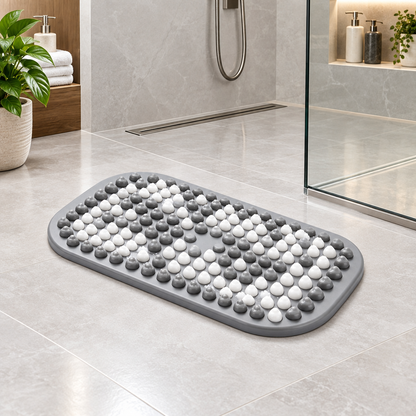 Textured bath mat in modern walk-in shower