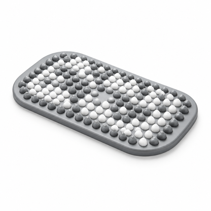 Gray and white textured bath mat on white background
